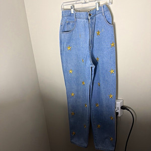 The Costspa Women’s XL Light Wash Blue Denim Jeans Gold Star Embroidered
