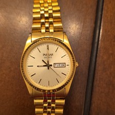Pulsar Quartz Vtg Mens 35mm Gold Tone Day/Dat...