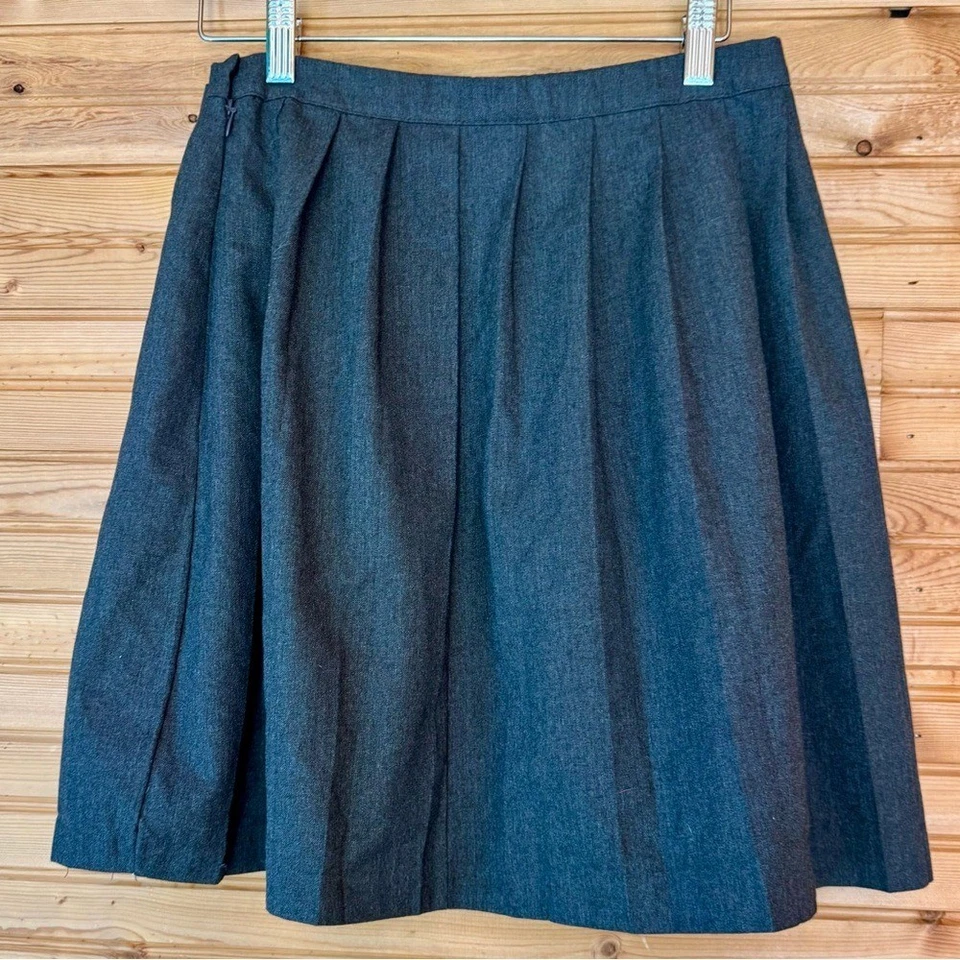 Falda escocesa plisada Next School línea A gris plata hebillas edad 12 uniforme Foto 2 de 4