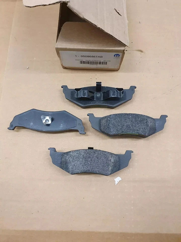 GENUINE MOPAR CHRYSLER PT CRUISER DODGE NEON REAR BRAKE PAD SET 05086567AB - Image 1 of 1