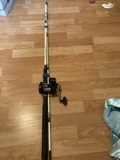 Cabela's Depth Master Gold Fishing Line Counter Reel + Shakespeare Tiger 2pc Rod