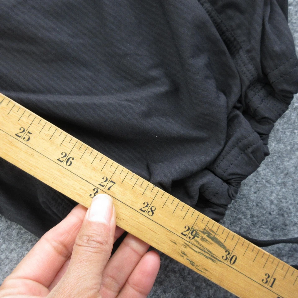 Pantalones deportivos informales Lululemon para mujer 8 negros de estudio de nailon dobladillo ceñido Foto 2 de 4