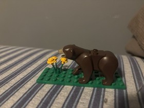 Genuine LEGO&reg; Dark Brown Bear Animal Minifigure from 4438 4440 Comes With Flower