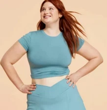 WOMEN’S REVERSIBLE BOW BACK SHORT SLEEVE TOP - BLOGILATES Cameo Blue- Size 1X