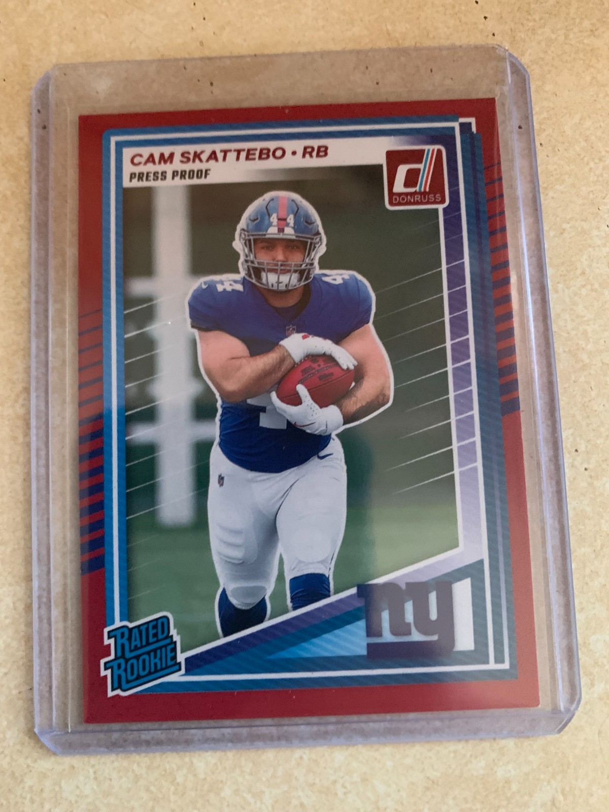 2025 Panini Donruss - Rated Rookie Cam Skattebo #302 Press Proof Red (RC)