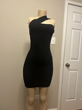 Black Stretch “Seduce Me Mini Dress” From Fashion Nova
