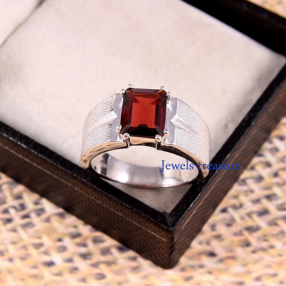 Silver ring shop with garnet stone