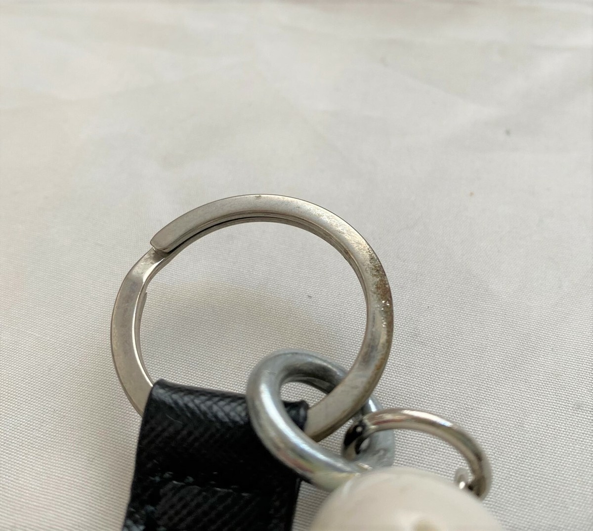 キーホルダー・キーリング PRADA  soft robot key ring in l and nylon s-l1200.jpg