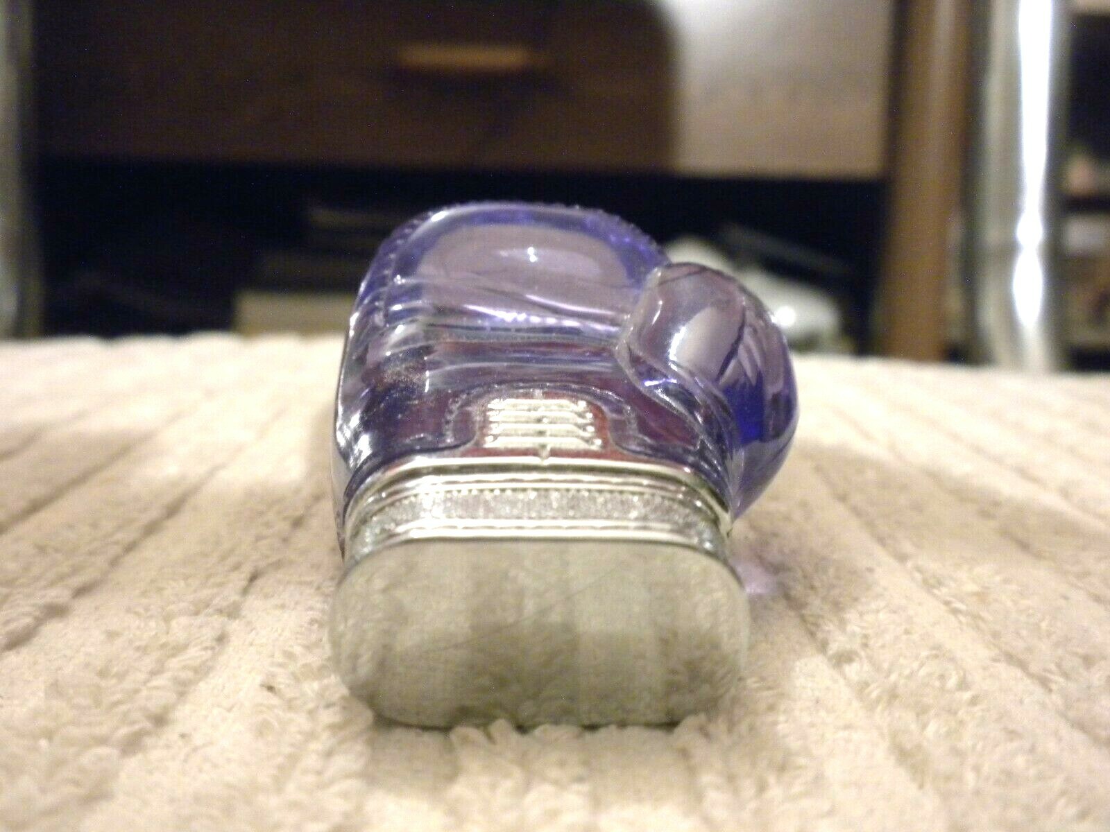 BOXING GLOVE LIGHTER IS IN GREAT CONDITION IT NEEDS BUTANE FLUID AND YOU ARE SET