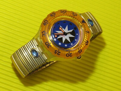 Swatch Scuba GOLDEN ISLAND mit goldfarbigem Flexarmband NEU aber OHNE Schachtel