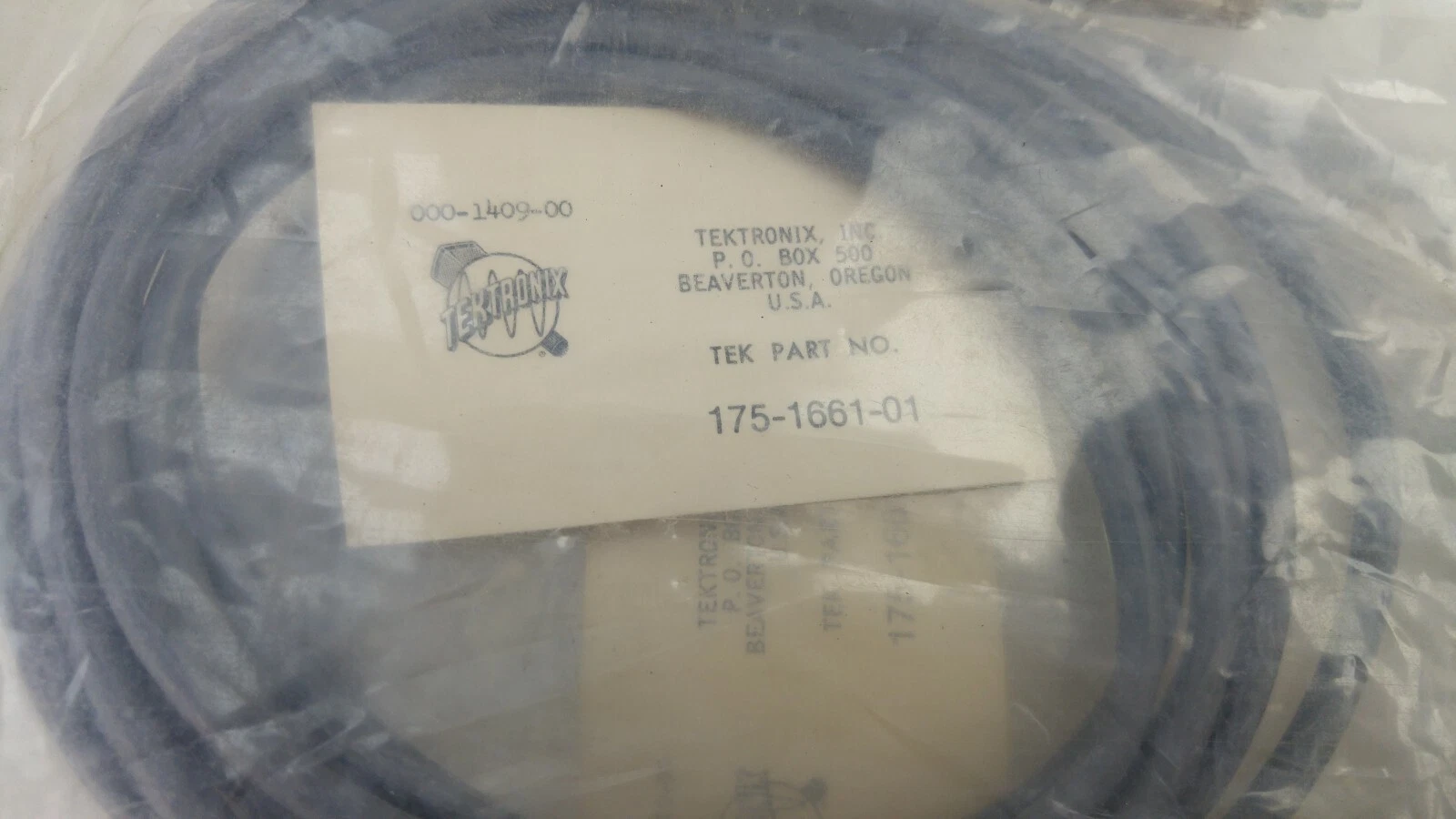 Coiled Tektronix 175-1661-01 cable with its Tektronix part card