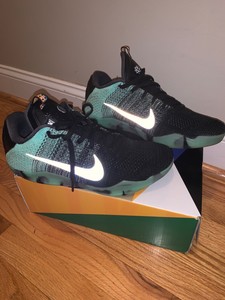 kobe 11 elite low green glow
