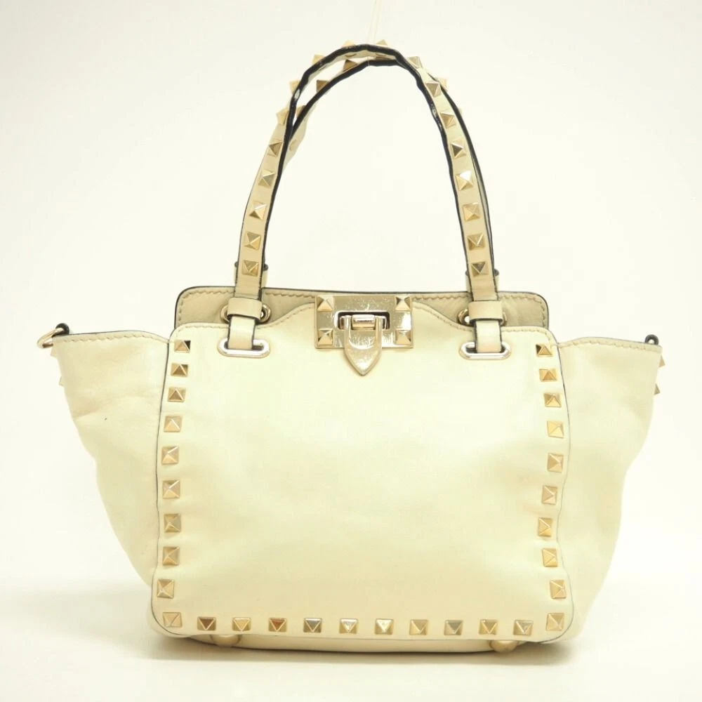 Cream hotsell valentino bag