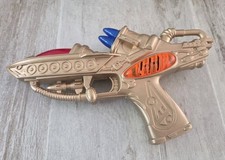Vintage Futuristic Style Gold Color Toy Space Blaster Gun. Light And Sound 1990s