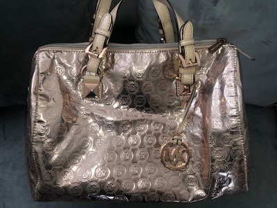 mk gold purse
