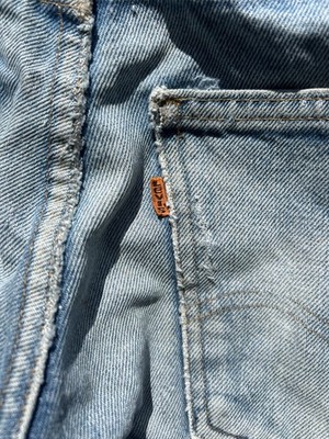 VINTAGE BIG E ORANGE TAB LEVIS FLARED/BOOTCUT DISTRESSED WEARED JEANS