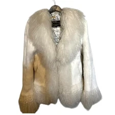 Winter coat is made of natural white rabbit fur, with llama fur on the collar S