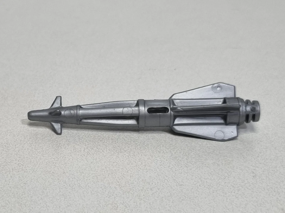 G.I.JOE Gijoe Hasbro ancienne pièce missile gris fusée bombe avion cobra corbeau - Photo 1/1
