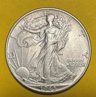 Uncirculated 1945 Philadelphia Mint Silver Walking Liberty Half Dollar.