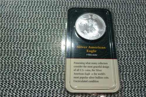 1986 American Silver Eagle Coin -  UNCIRCULATED 99.95 SILVER 31.101 GRAMS