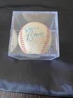 Ernie Banks Autographed Baseball.  Charles “Chub” Feeney President.
