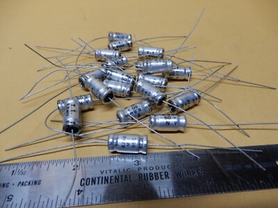 T. I. Electrolytic? Capacitors 6.8uf 50V Qty 20 NOS N P Axial Leads