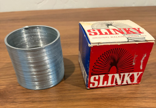 Vintage Slinky original metal walking spring toy James Industries New in old box