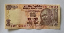 India 10 rupee note, 2010 Gandhi M inset. Governor Subbarao.  Uncir and unused