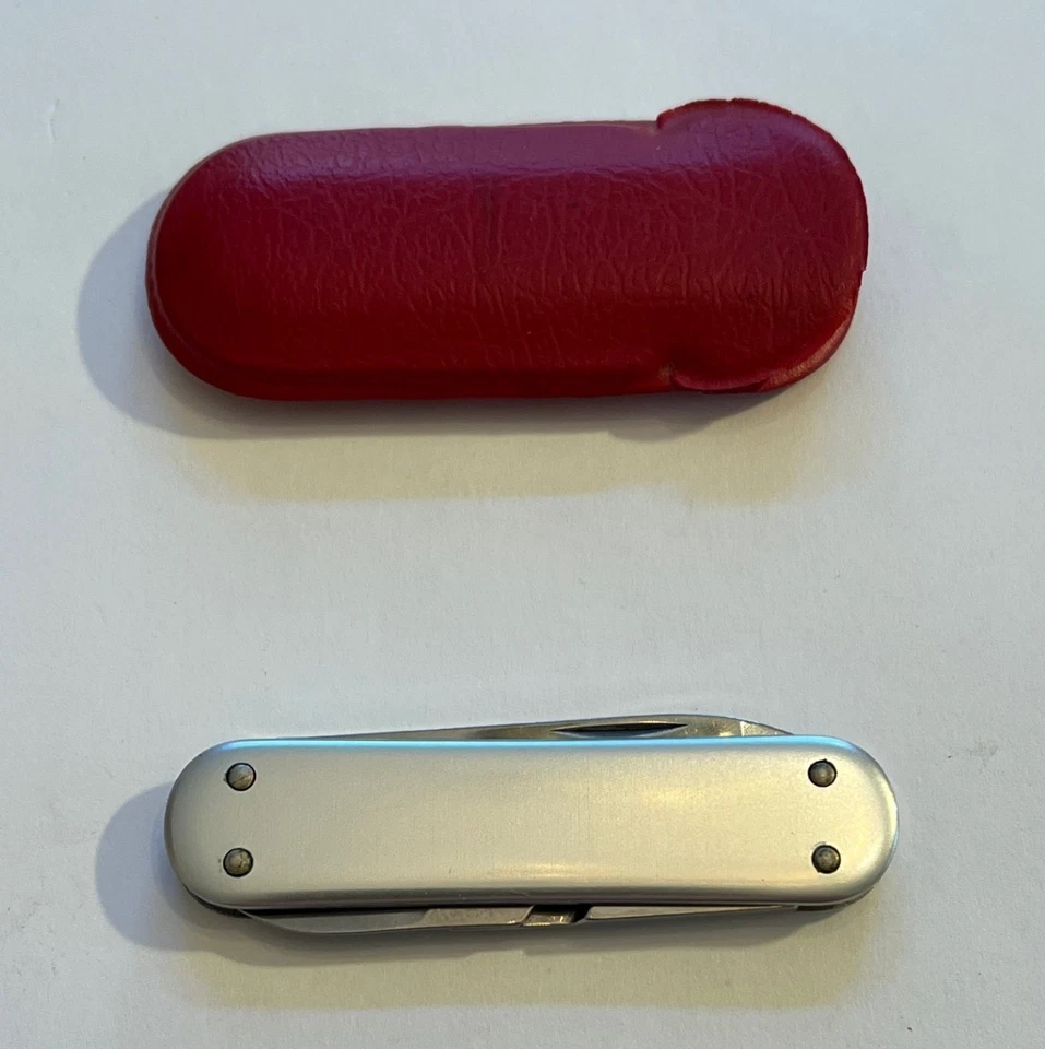 Navaja suiza de acero inoxidable Victorinox con logotipo vintage Lockheed RARA - 3 herramientas - perfecta Foto 2 de 4