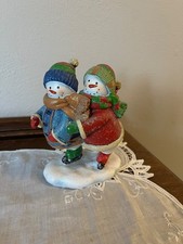 Snowman Skaters Figurine