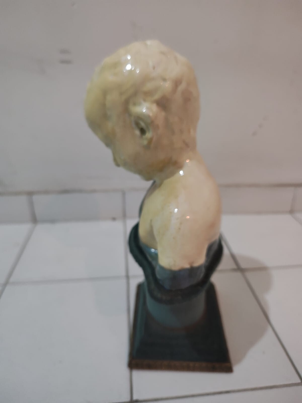 Ancient Roman bust of a pensive boy with lectern, illegible mark. Beautiful piec