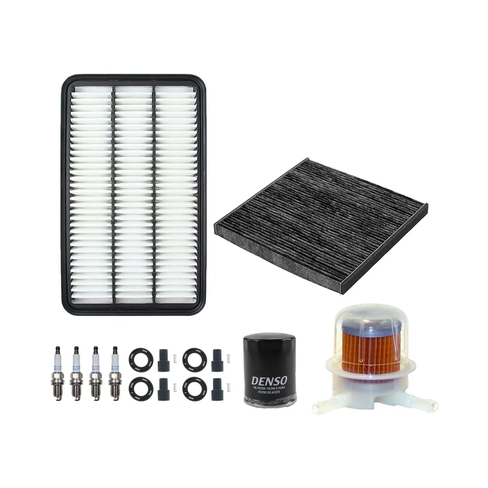 Kit de 4 bujías y botas Denso Tune Up Kit para Toyota Solara SE 2.4 L4 2002-2003 Foto 2 de 2