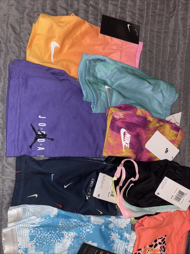 Nuevo con etiquetas Nike Lote 9 Niñas Talla 4 Pantalones Cortos y Una Camisa Varios Colores Foto 2 de 3