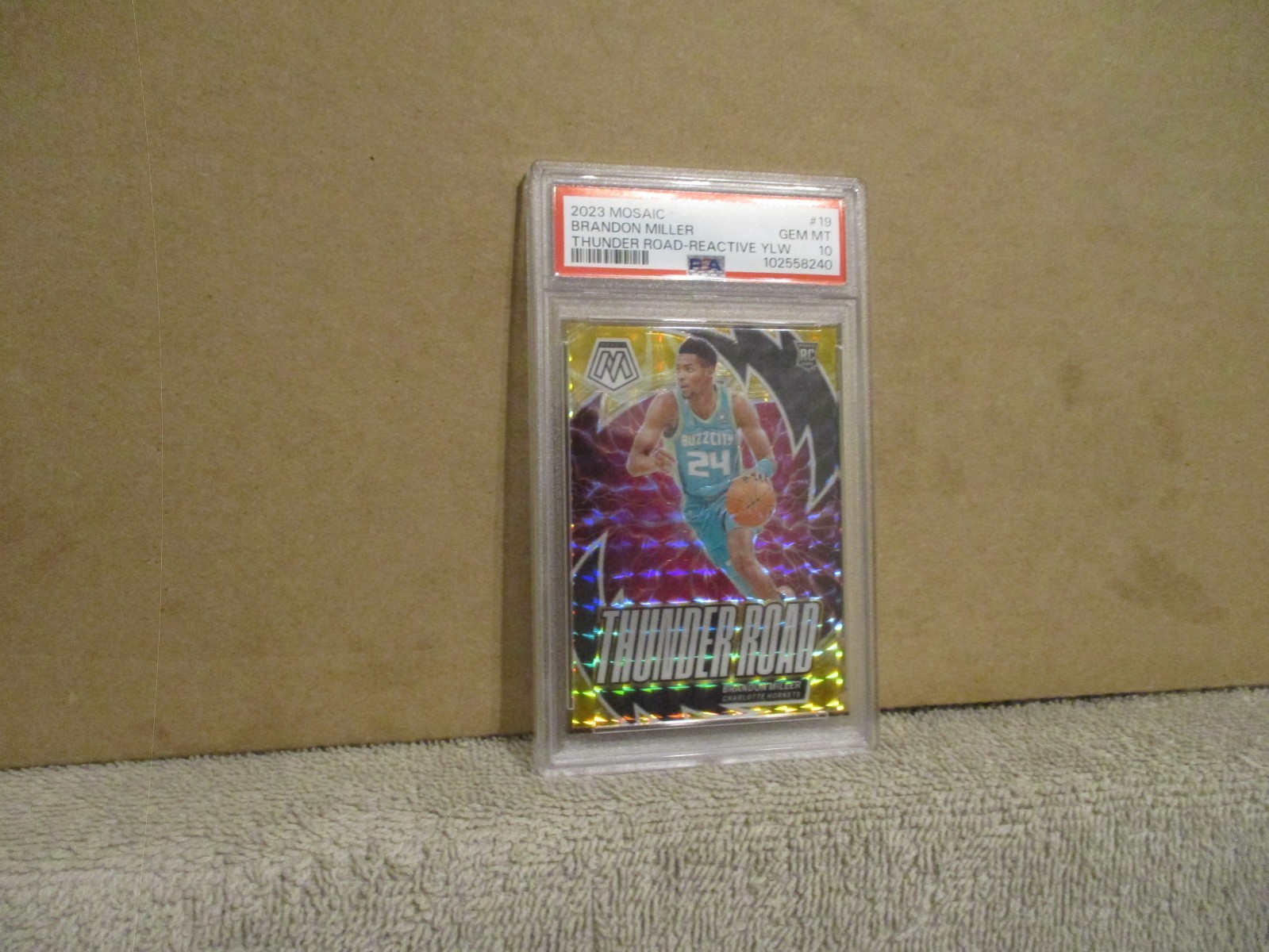 2023-24 MOSAIC BRANDON MILLER #19 RC THUNDER ROAD REACTIVE YELLOW 17/99 PSA 10