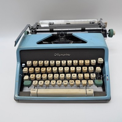 Vintage Olympia SM7 Deluxe Manual typewriter, Light Blue, West Germany 1960s