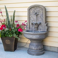 Lovely Lily Polyresin Flat Back Outdoor Wall Fountain by Sunnydaze
