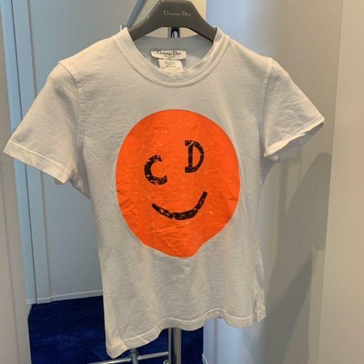 Christian Dior neon orange smiley face 