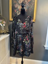 Parker  Wrap Dress Black Floral Size M.