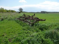 Photo 6x4 Monxton - Tilling Machine A tilling machine that has been left  c2010