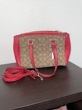 Signature Coach Stanton Carryall Bag in Khaki And Red Leather.