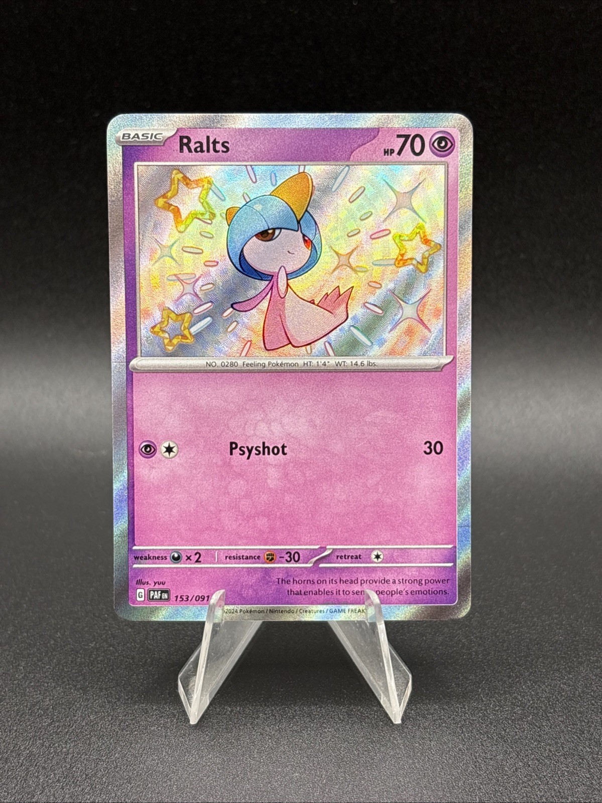 Ralts 153/091 SV: Paldean Fates Holo