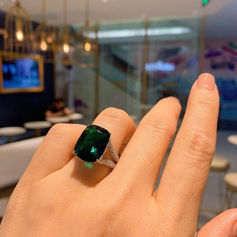 Best emerald engagement best sale rings