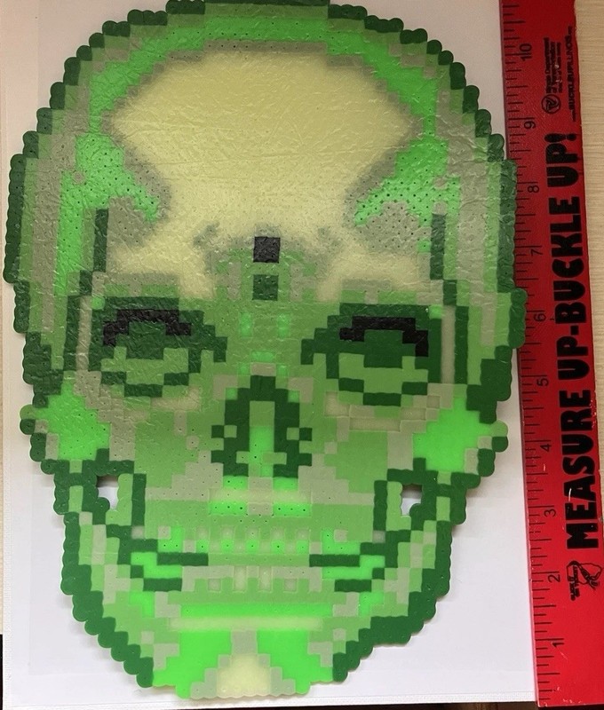 handmade green pixel skull perler bead wall art