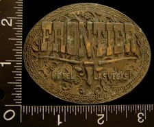 LI20138 VINTAGE  FRONTIER LAS VEGAS HOTEL  GAMBLING BRASSTONE BELT BUCKLE