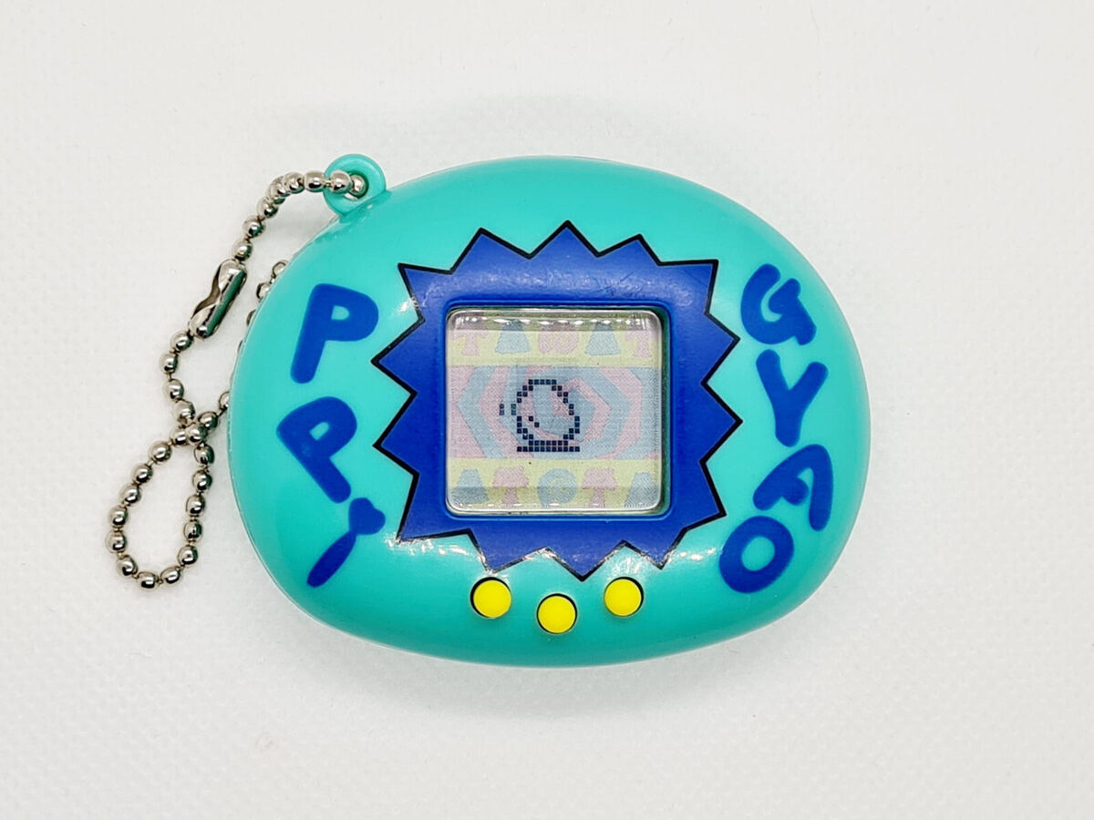 TAMAGOTCHI ON ANIMAL VIRTUEL INTERACTIF ROSE de chez BANDAI - Gonçalves  Lobo Numismatique