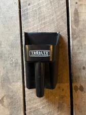 New black feed scoop tribute