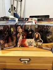 WWE Mattel Action Figure Lot, Two Undertakers And A Paul Bearer
