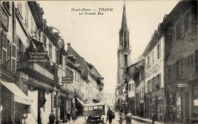 Ak Thann Elsass Haut Rhin, Grande Rue, Kirche, Brotfabrik - 4798020