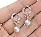 Radiant Floral CZ Drop Earrings with Orange Petals and Pearl Accent