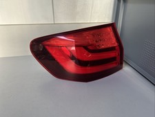 BMW 5er F11 Touring Rückleuchte Heckleuchte Seitenwand links 7203233